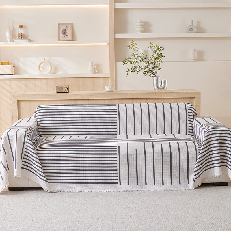 Cover di divano multicolore del modello geometrico - design moderno per una casa elegante