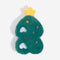 Pine-green texture with “ornament” dimples—tiny forest on a paw.