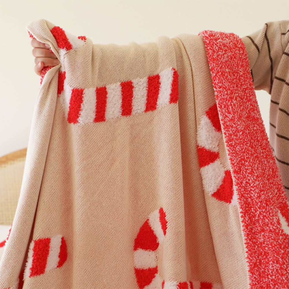 Couverture en tricot douillet avec oreiller en forme de canne à sucre de Noël